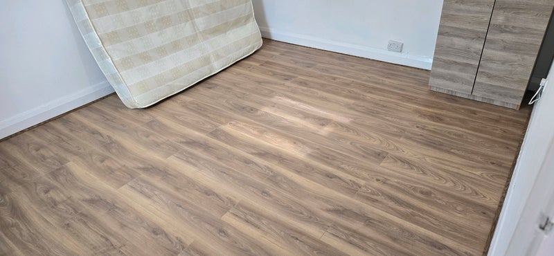 Photo 1: Large bedroom.