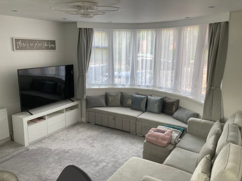 Photo 1: Studio Lounge with big screen tv and comfortable seating