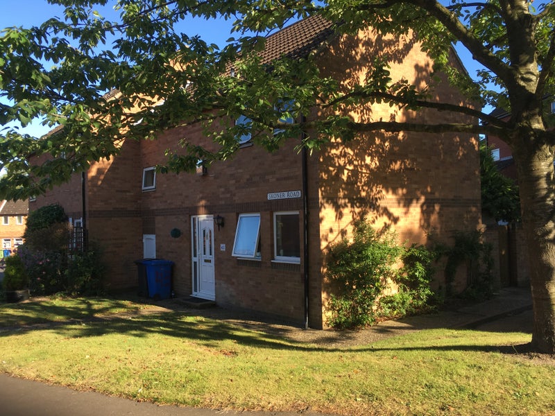 Photo 1: Exterior front