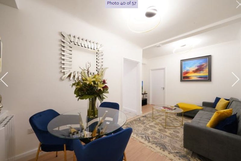 Photo 1: Shared living room
