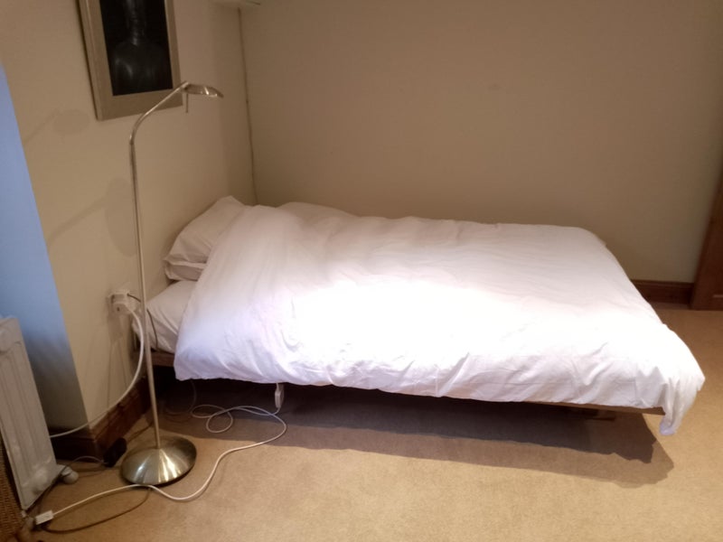 Photo 1: Bed folded out