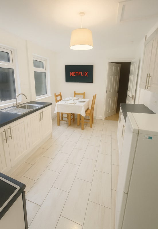 Photo 1: Large, well-equipped kitchen leading out to a beautiful garden that comes alive in the summer.
