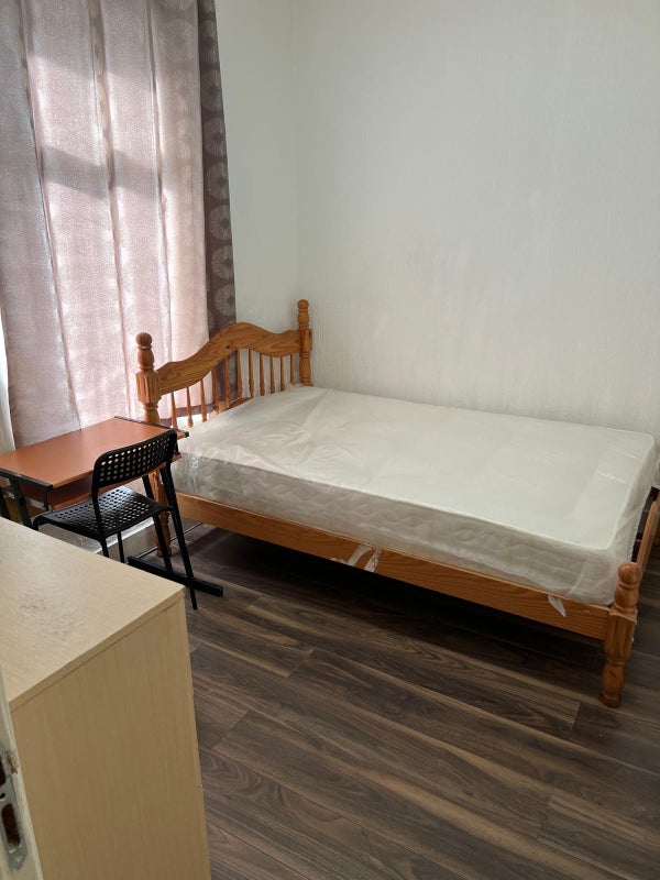 Photo 1: Room with double bed.