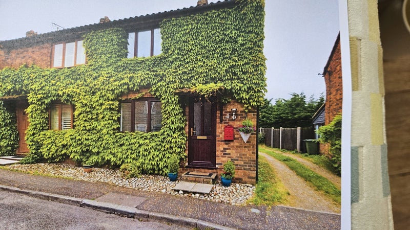 Photo 1: Front of house 
