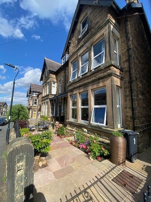 Photo 1: Front of house