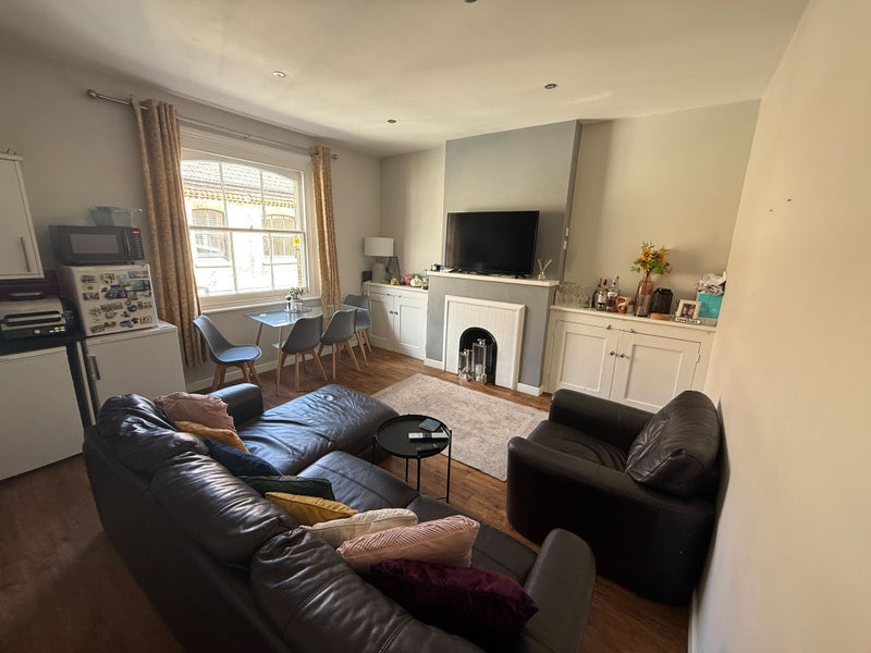 Photo 1: Shared living area 