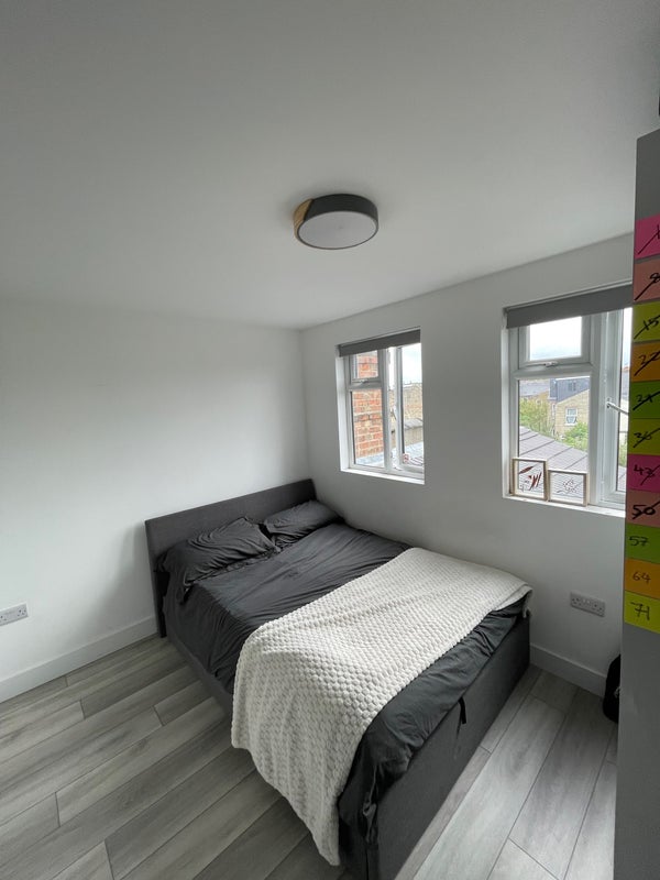 Photo 1: Double bedroom (bed can be pulled up with extra storage underneath)