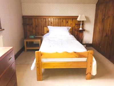 Photo 1: Bed , Cupboards Plenty of Storage for Hanging and Folded Clothes