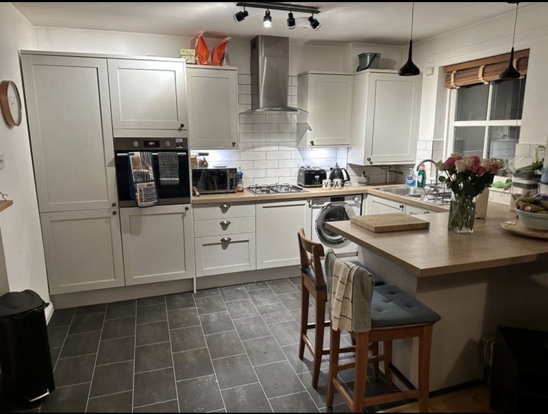 Photo 1: Kitchen and the living room