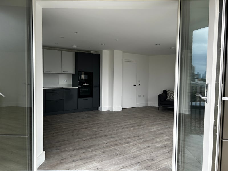 Photo 1: View from terrace into Kitchen/Living Room