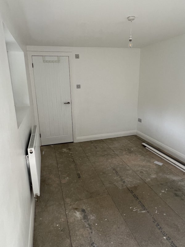 Photo 1: Main living/bedroom