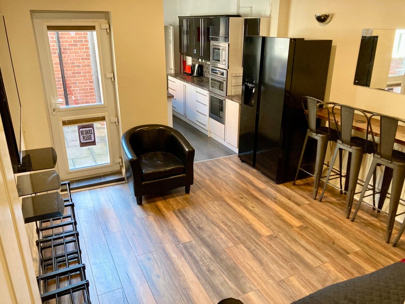 Photo 1: Communal Lounge