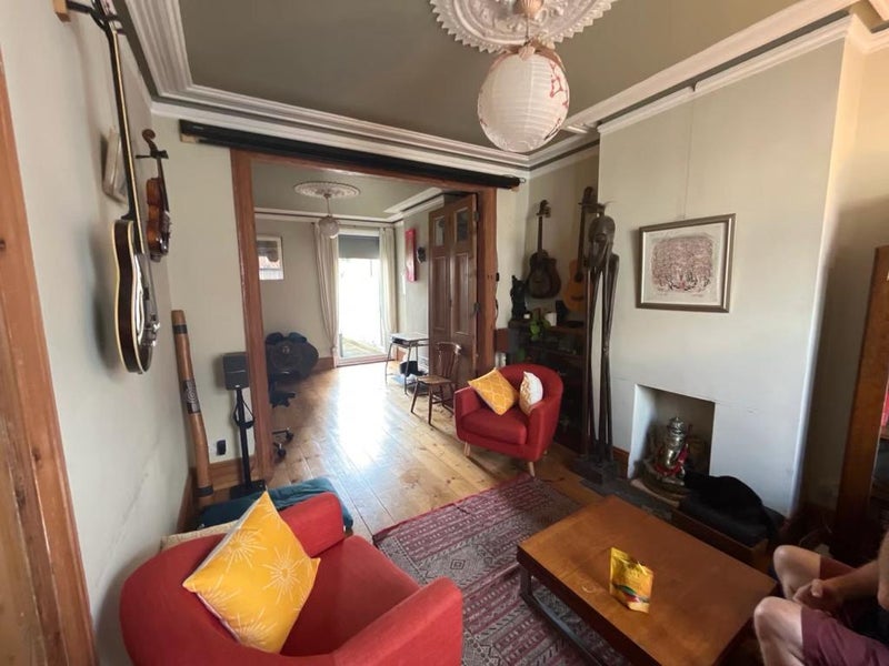 Photo 1: Shared Living Room