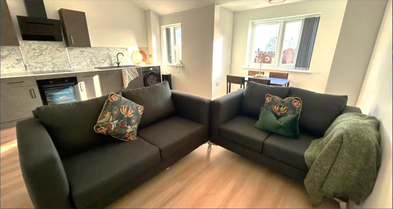 Photo 1: Shared living space