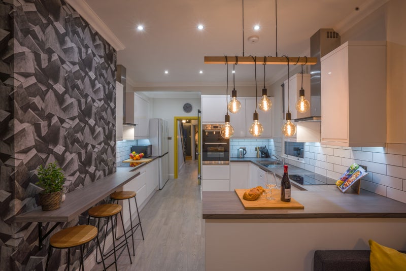 Photo 1: Kitchen - two Fridge Freezers, two Hobs