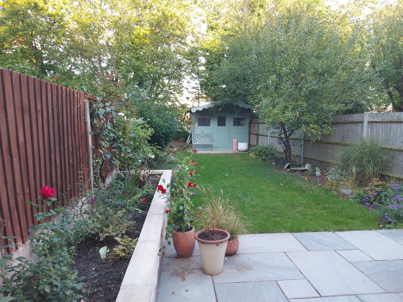 Photo 1: Garden and patio area