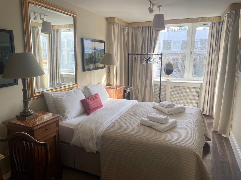 Photo 1: Bedroom One With Balcony