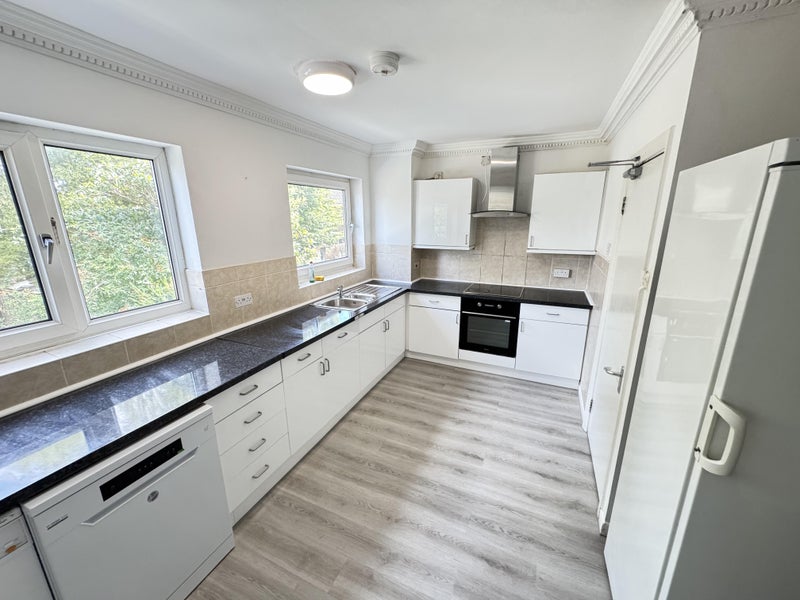 Photo 1: Kitchen