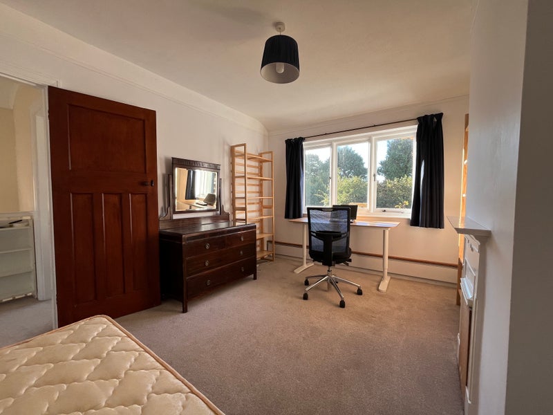 Photo 1: front double bedroom (afternoon sun)