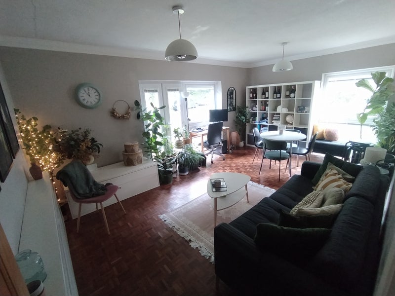 Photo 1: Shared lounge with home office desk