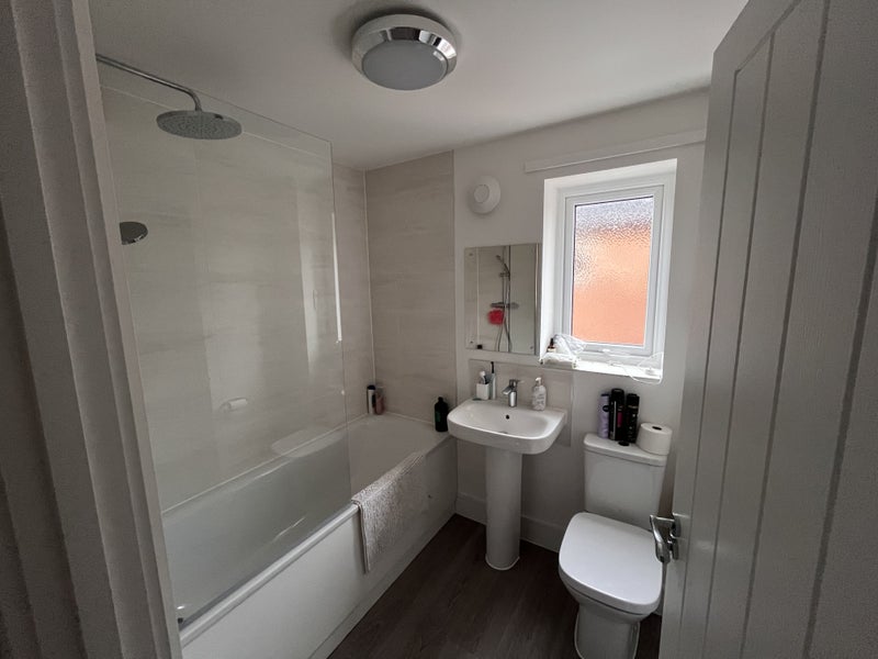 Photo 1: Shared bathroom