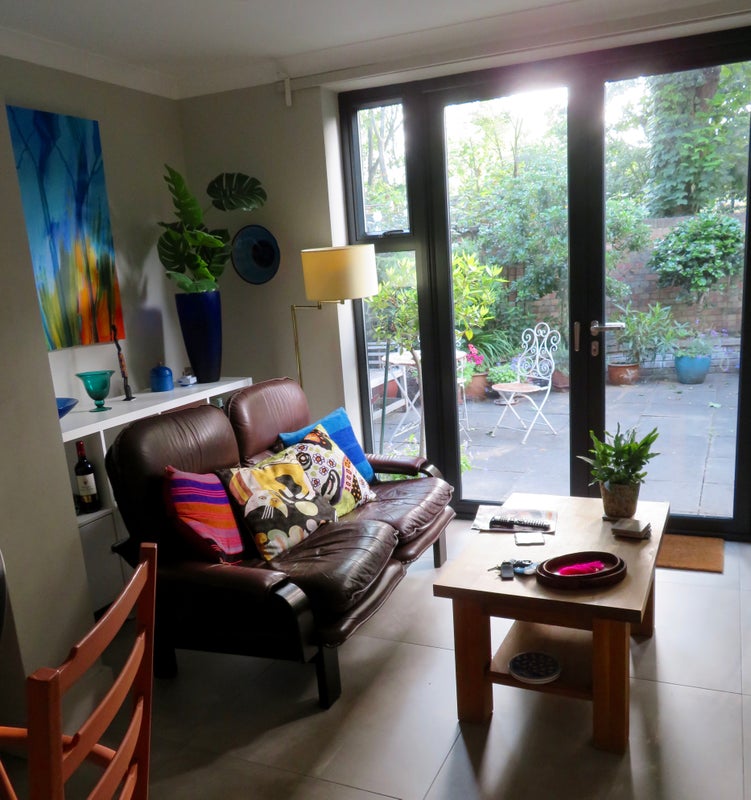 Photo 1: From kitchen out to the garden