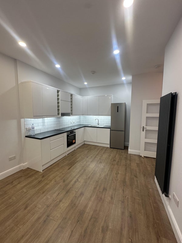 Photo 1: Living Room & Kitchen