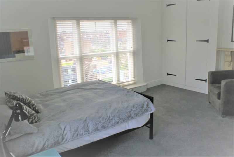 Photo 1: Bedroom 5 bed with large window overlooking central Southsea
