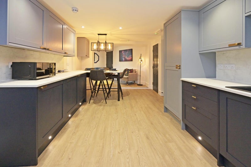 Photo 1: Shared kitchen & breakfast bar