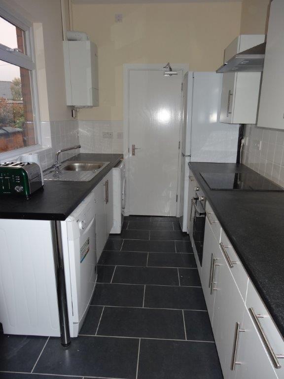 Photo 1: Kitchen