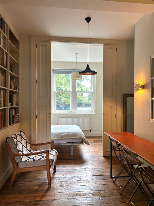 Photo 1: MAIN ROOM AND WALL BED 