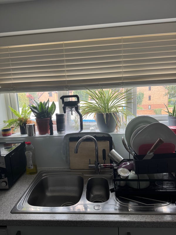 Photo 1: Spacious kitchen with washing machine fridge and electric induction cooker 