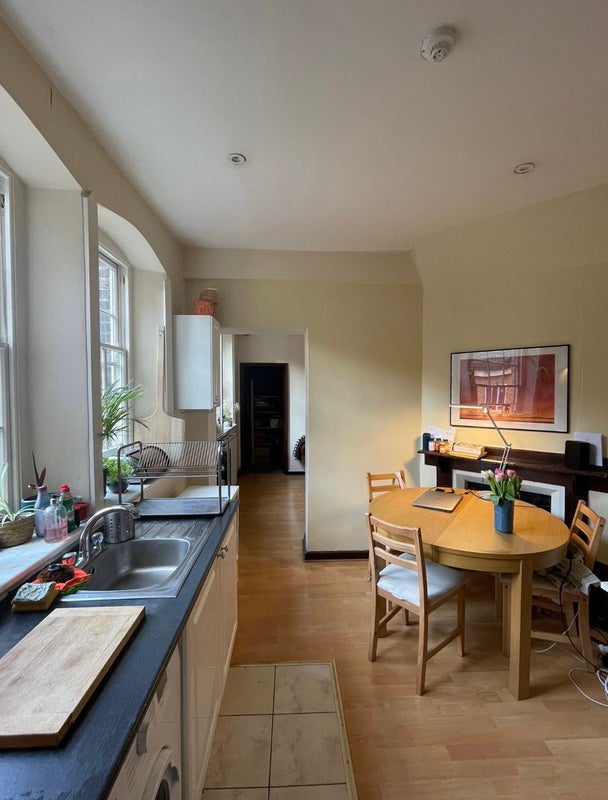 Photo 1: Shared kitchen and dining space