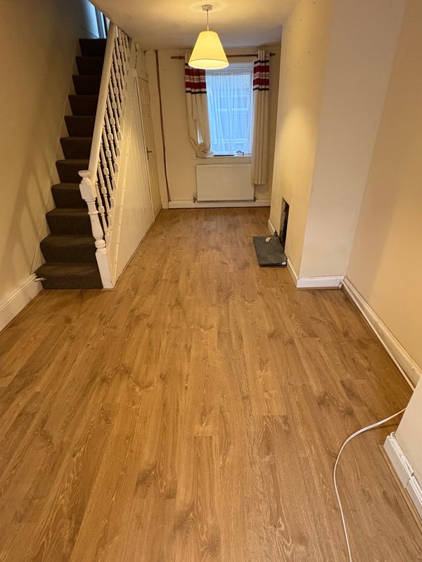 Photo 1: New laminate floor fitted in the lounge 01/10/2025 😊