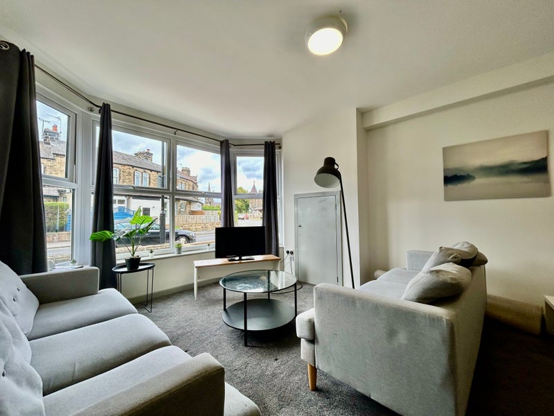 Photo 1: Communal Lounge 