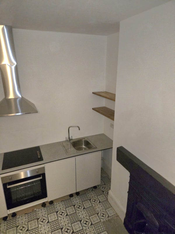 Photo 1: Kitchen