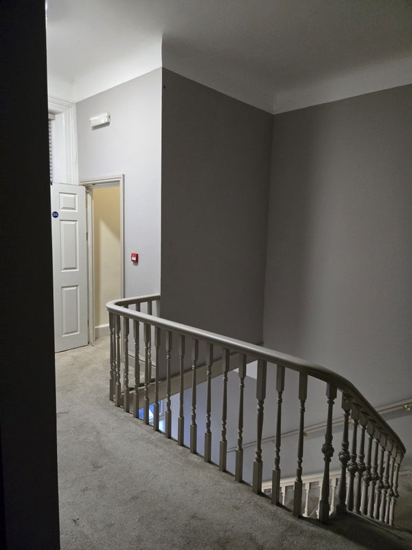 Photo 1: Middle floor hallway