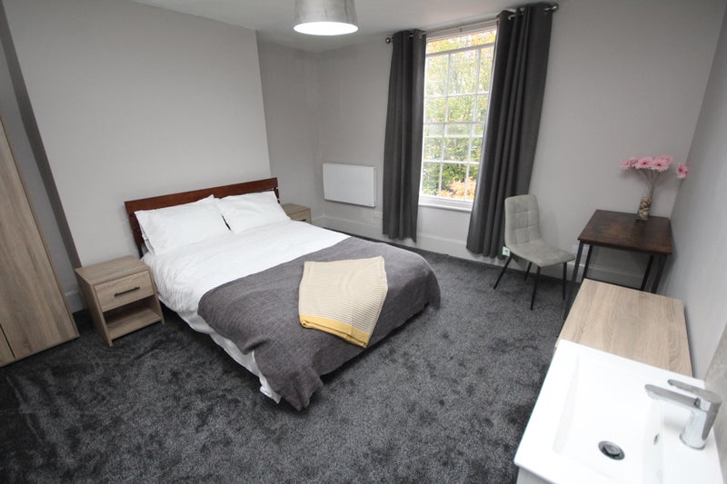Photo 1: King Size Ensuite furnished bedroom 
