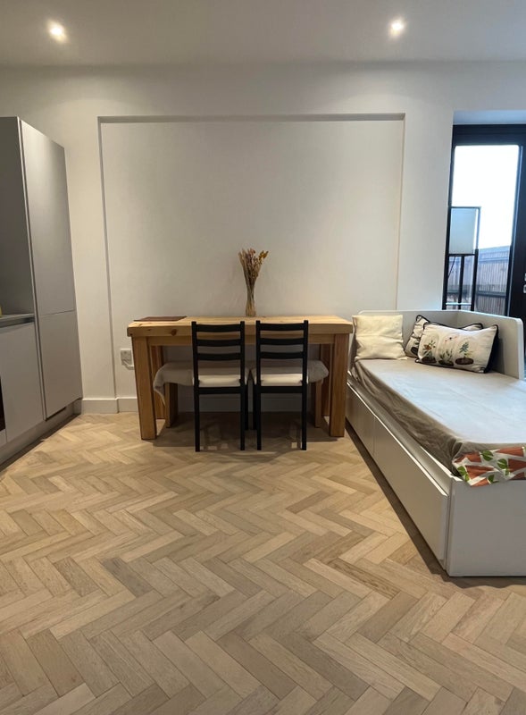 Photo 1: Living space