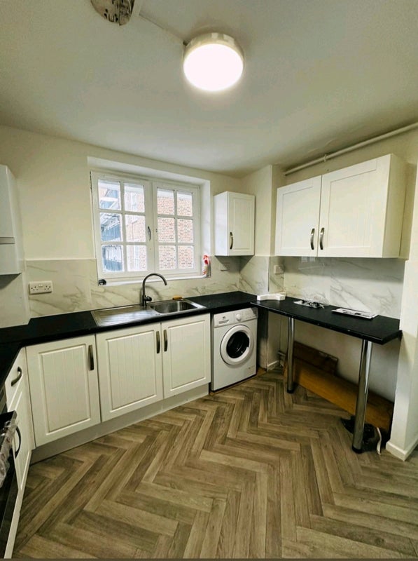 Photo 1: Kitchen