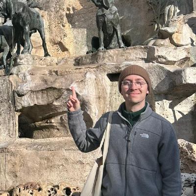 Photo 1: trying to point at the dog