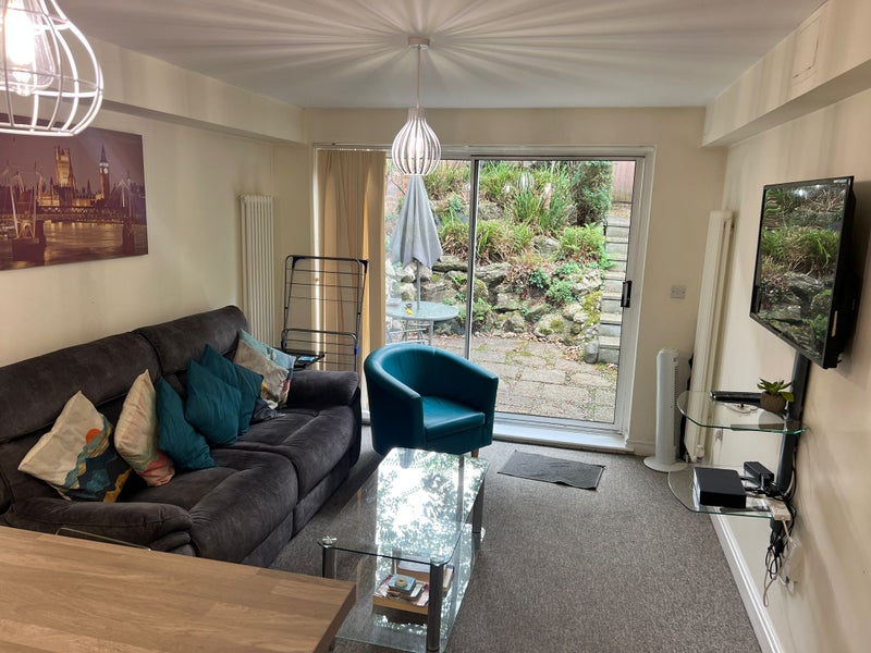 Photo 1: Chill area for tv and Garden 
