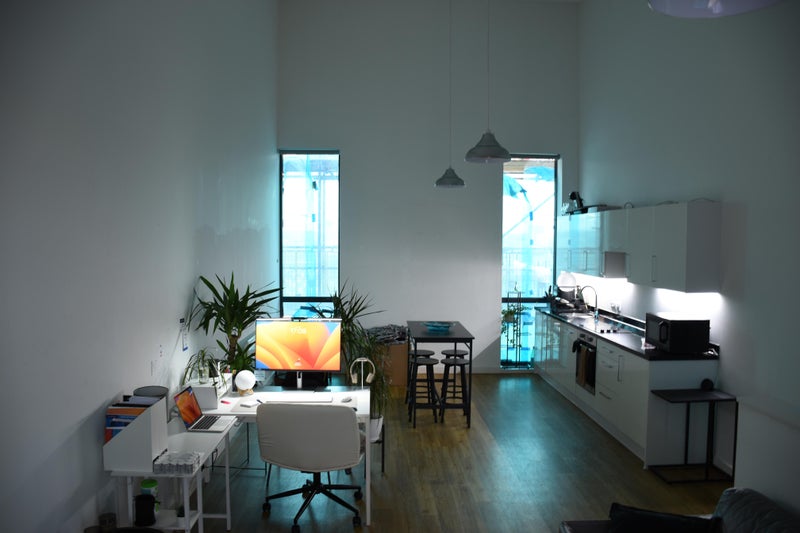 Photo 1: Shared living room with kitchen
