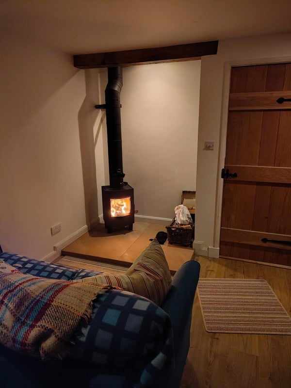 Photo 1: Wood burning stove