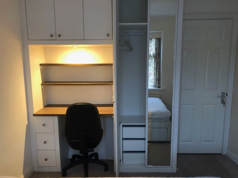 Photo 1: intergated workstation and floor to ceiling wardrobe (room 2)