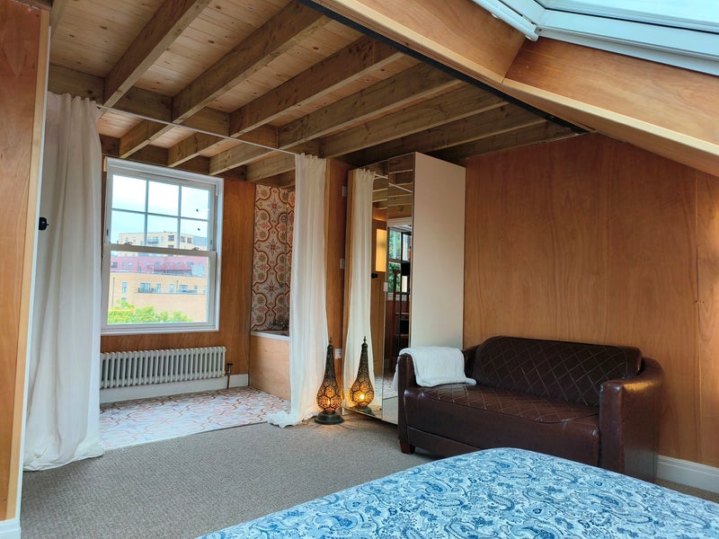 Photo 1: Bedroom 1 - £1300 with open plan bathing and changing.  Separate toilet and sink