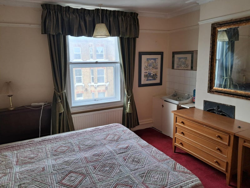 Photo 1: Street view, but quiet as triple-glazed