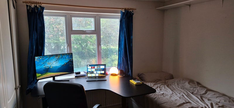 Photo 1: The available room.