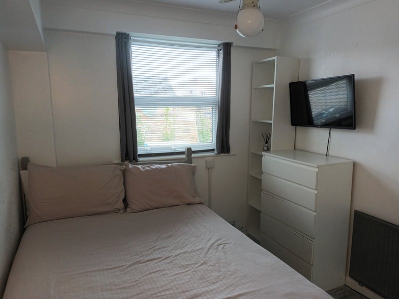 Photo 1: TV included