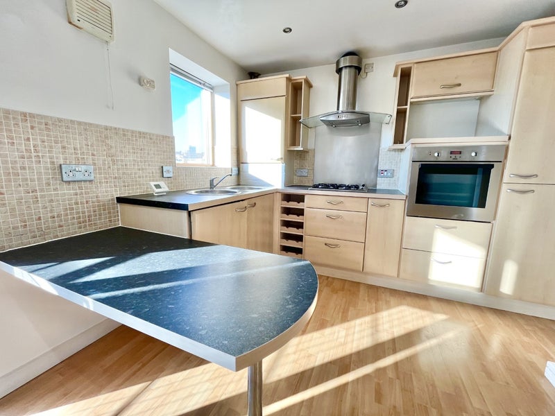 Photo 1: Kitchen
